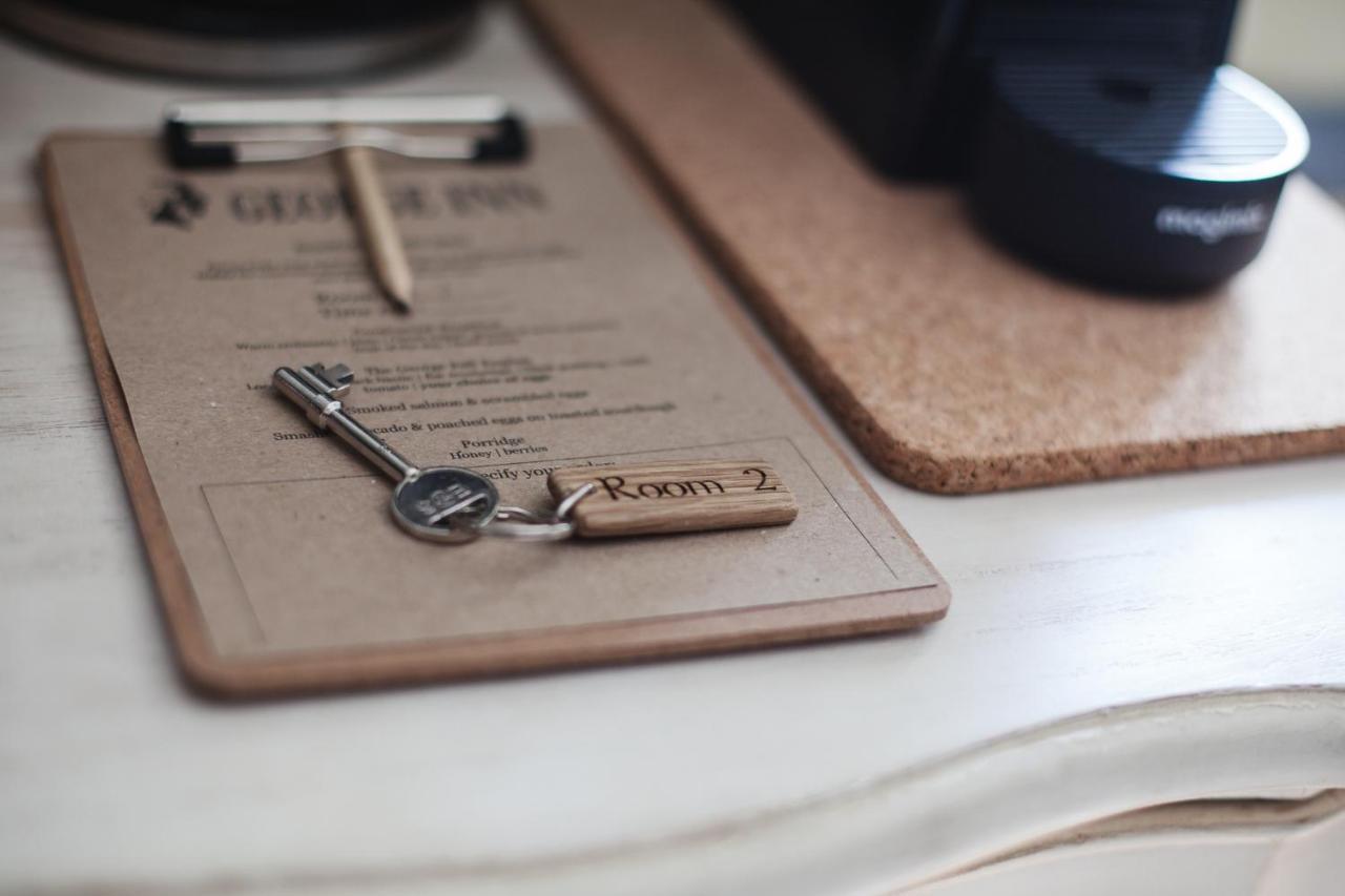 The George Inn Barford St Michael ภายนอก รูปภาพ A room key
